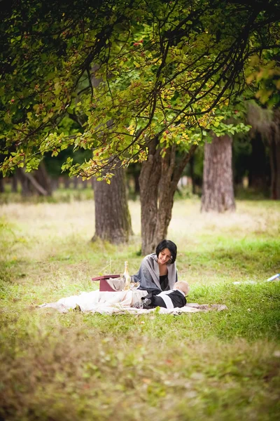 Mom on a date with a young son on the nature — Stock Photo, Image