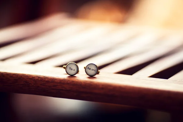 Men's Cufflinks with the words "the end" — Stock Photo, Image