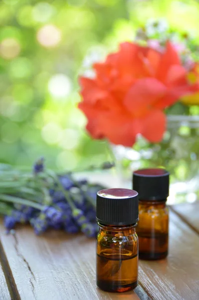 Herbal flowers and essential oils — Stock Photo, Image
