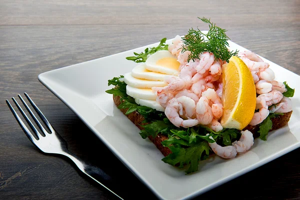 Delicious shrimp salad sandwich on a plate — Stock Photo, Image