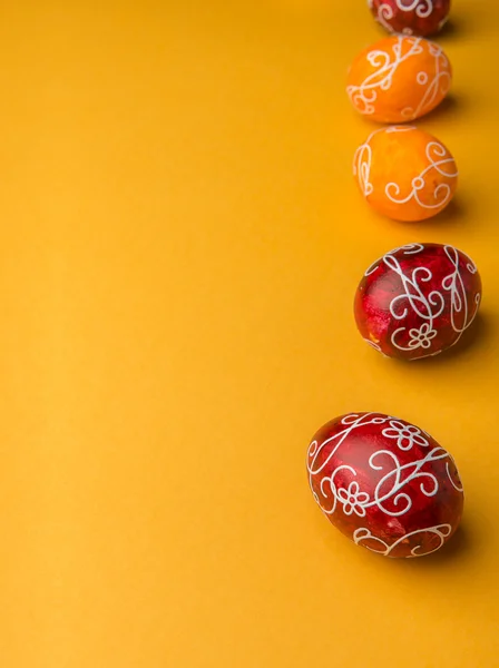 Easter Eggs on yellow background — Stock Photo, Image