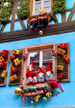 Beautiful decorations in the town of Kaysersberg in Alsace clipart