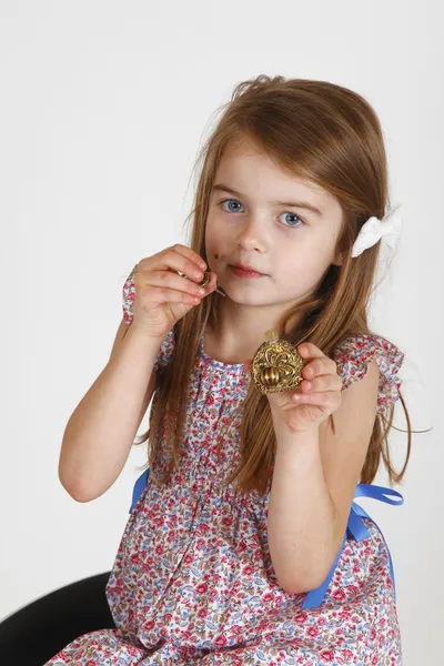 Young girl on the chair — Stock Photo, Image