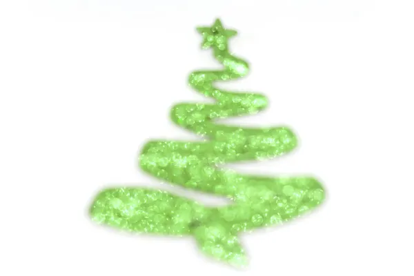 The green toy Christmas tree is unfocused — Stock Photo, Image