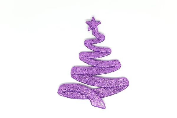 Leksak julgran av lila färg på en vit bakgrund — Stockfoto