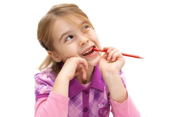 Douce petite fille avec un crayon à la main — Photo