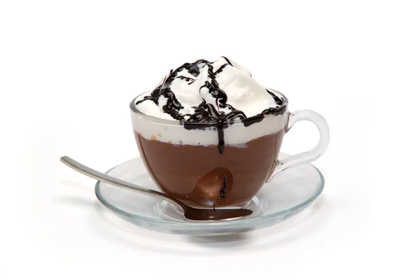 Горячий шоколад со сливками и сиропом в стеклянной чашке Лицензионные Стоковые Изображения