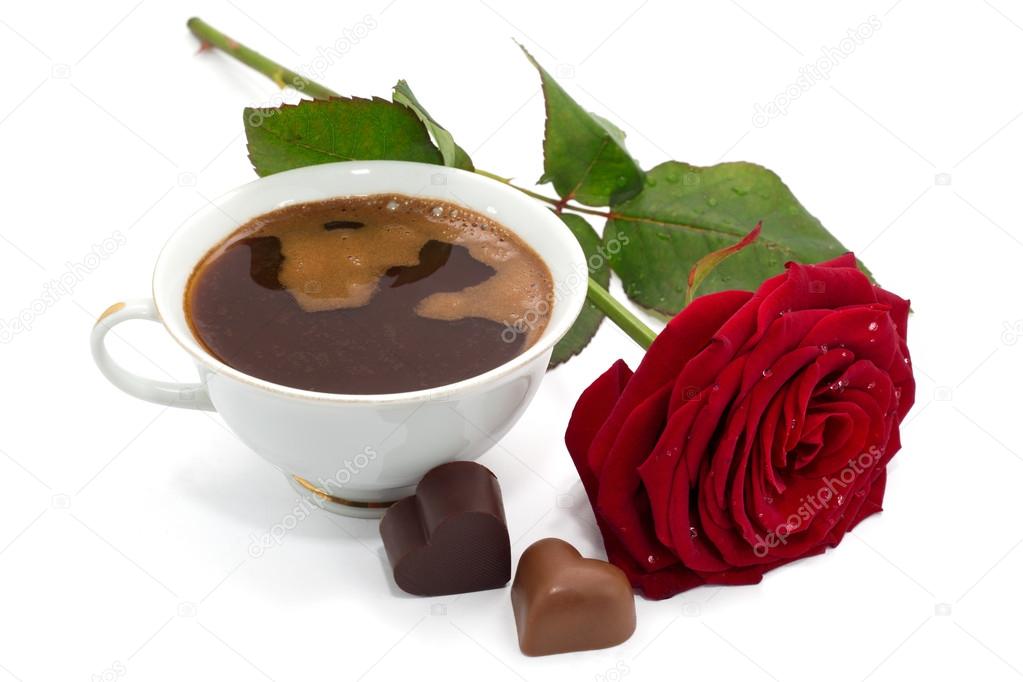 Beautiful red rose, cup of coffee and chocolate candies isolated