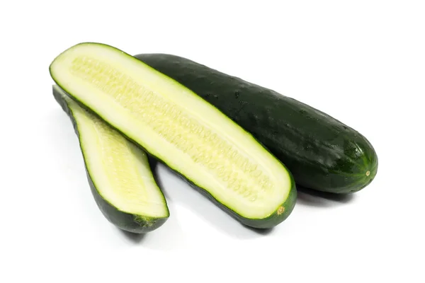 Fresh cucumber and slices isolated on white — Stock Photo, Image