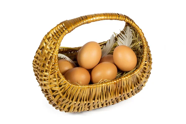 Brown Chicken Eggs and Pen in a Wicker Basket Isolated on White — Stock Photo, Image