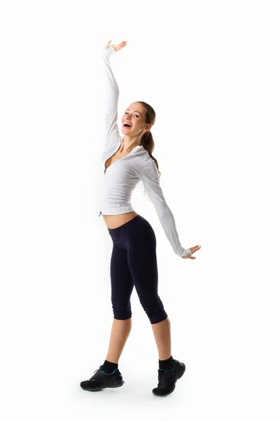 Ung vacker kvinna poserar i en gym-outfit. — Stockfoto
