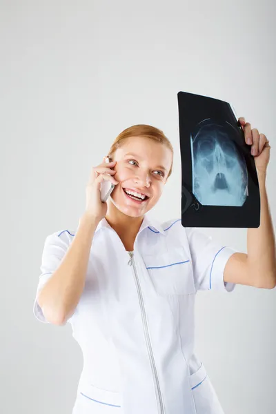 Medical person: Nurse portrait. Confident young woman medical professional isolated on white background. — Stock Photo, Image