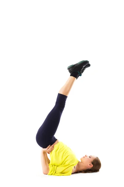 Deportiva chica haciendo ejercicios de estiramiento —  Fotos de Stock