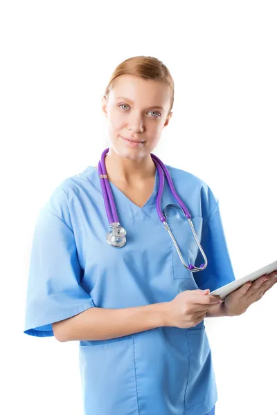 Beautiful young female medical intern with tablet computer Royalty Free Stock Photos