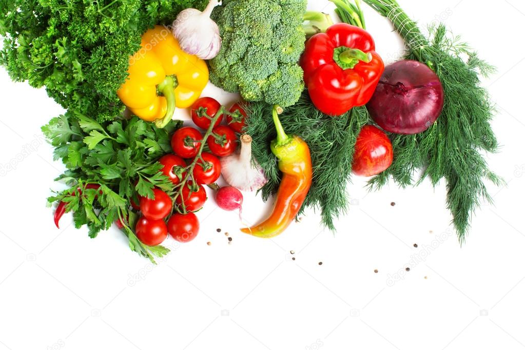 decorative pattern of fresh vegetables on white background