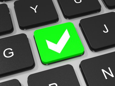 dizüstü bilgisayarın klavyesinde yeşil kene anahtar.