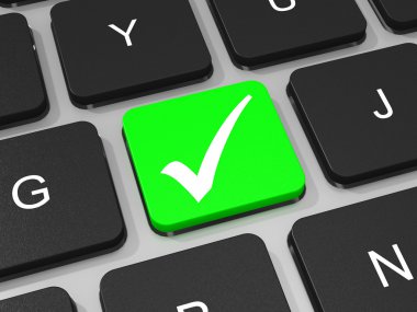 dizüstü bilgisayarın klavyesinde yeşil kene anahtar.