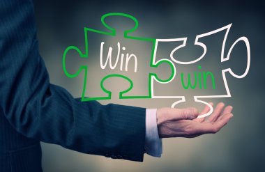 win win Yapboz işaret eden işadamı