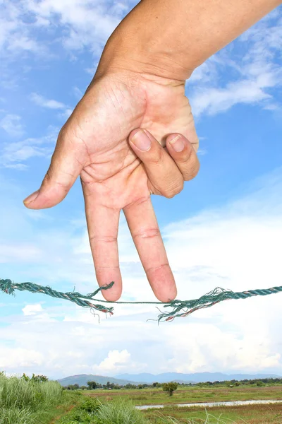 Hand and rope — Stock Photo, Image