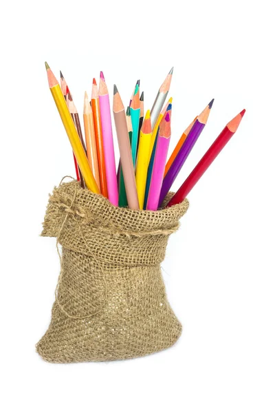 Colour pencils and notebook on white background — Stock Photo, Image