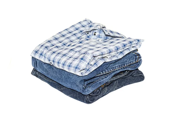 Stapel van kleurrijke kleding witte achtergrond — Stockfoto