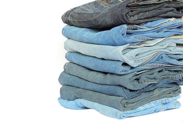 stack of blue denim clothes 