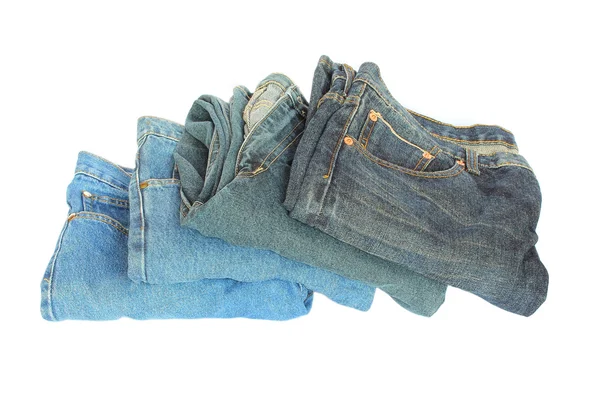 Stapel blauwe denim kleding — Stockfoto