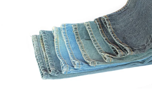 Stapel blauwe denim kleding — Stockfoto