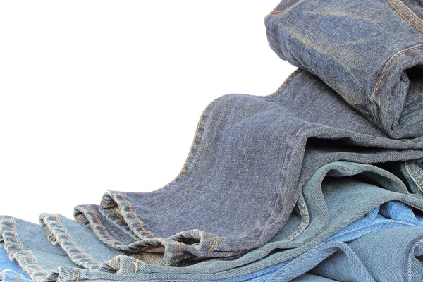 Stapel blauwe denim kleding — Stockfoto