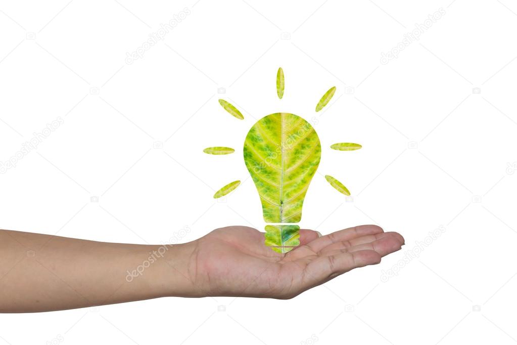 Light bulb made of green leaf on woman hands  Green eco energy c