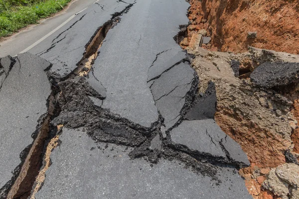 Layer of broken asphalt road at rural areas — Stock Photo, Image