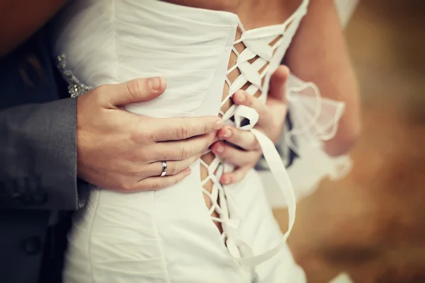 Groom holding the bride — Stock Photo, Image