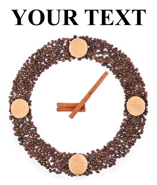 Clock from coffee beans, biscuits and cinnamon sticks — Stock Photo, Image