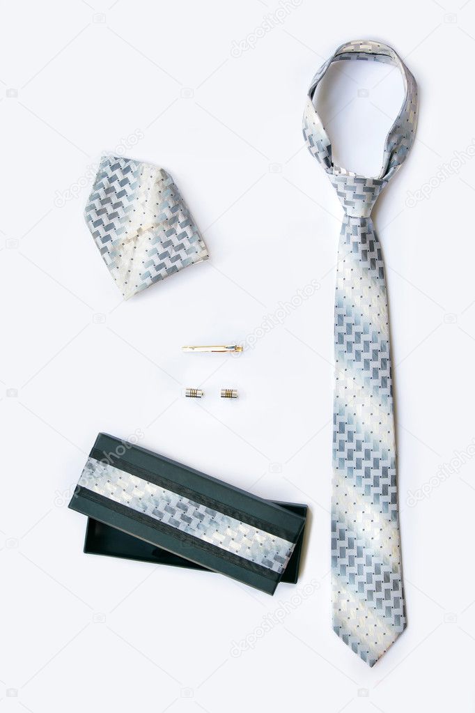 Cufflinks, tie and tie clip, handkerchief and gift box.