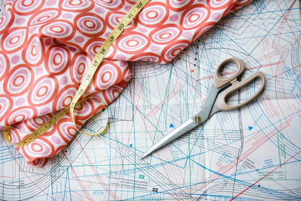 Pattern, measuring tape, scissors and silk material