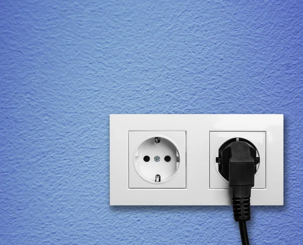 Saída elétrica em uma parede — Fotografia de Stock