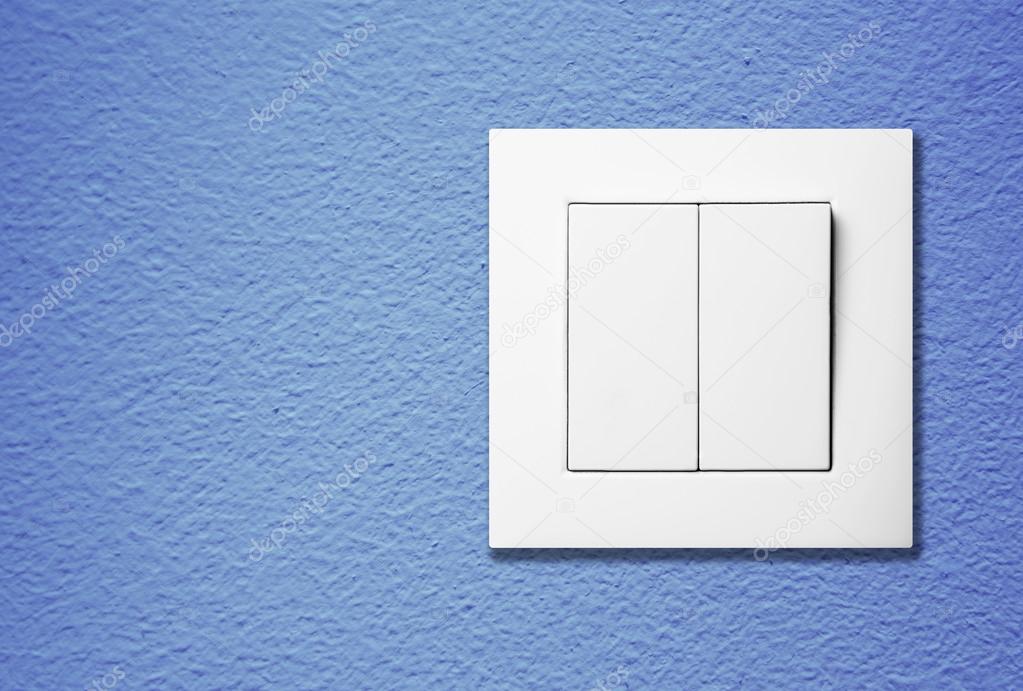 Light switch on a wall