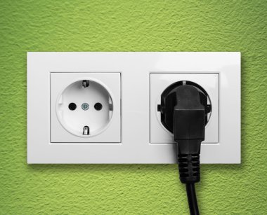 Electric outlet with cable plugged clipart
