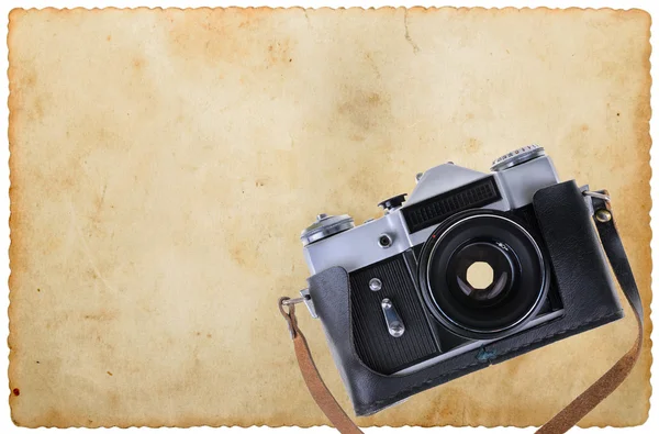 Old camera on the old paper — Stock Photo, Image