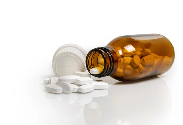 Yellow pill bottle isolated on a white background — Stock Photo, Image