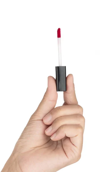 手握笔刷 用于在白色底色上隔绝的化妆品口红 — 图库照片