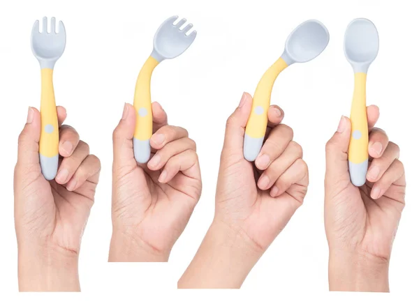 Collection Hand Holding Bendable Kids Training Spoon Fork Set Isolated — Stock Photo, Image