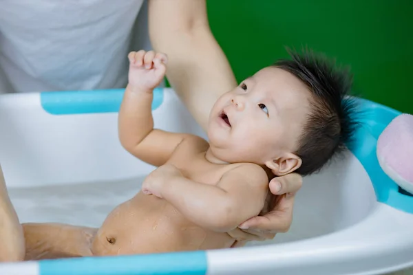 Little Baby Bathing Mothers Hands — Stock Photo, Image