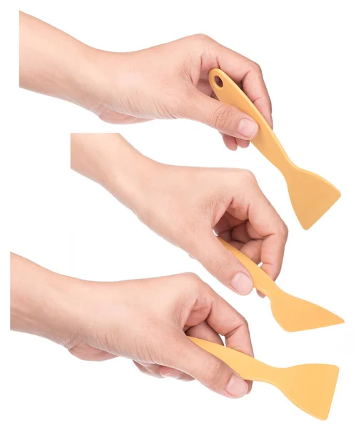 Conjunto Mão Segurando Raspador Plástico Amarelo Isolado Fundo Branco — Fotografia de Stock