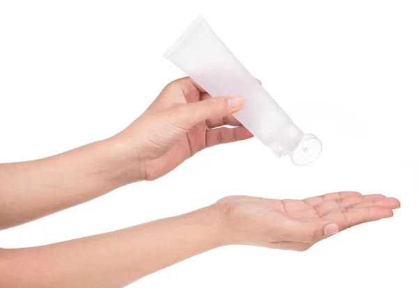 Hand Houden Blanco Knijpen Fles Plastic Buis Geïsoleerd Witte Achtergrond — Stockfoto