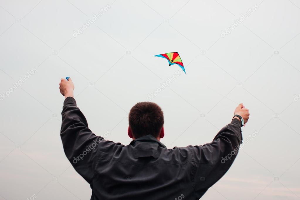 Man controls a kite