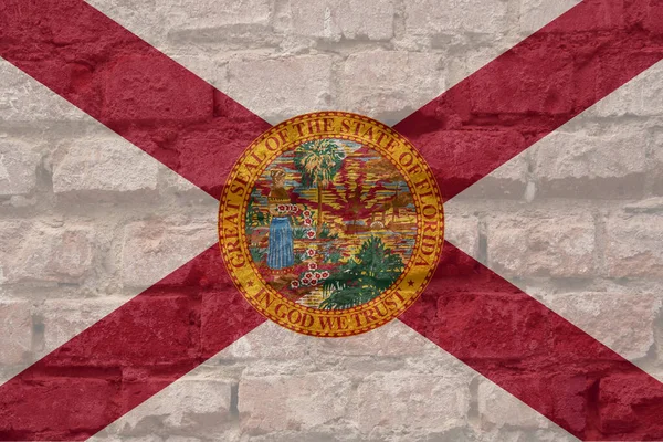 フロリダ州の旗がレンガの壁に描かれている — ストック写真
