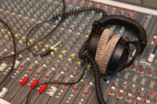 Sound mixing console with headphones — Stock Photo, Image