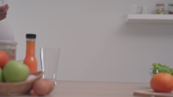 Pregnant Woman Flick Fingers Kitchen Preparing Orange Juice Good Emotion — Stock Video