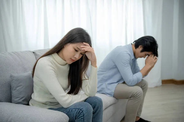Divorce. Women are disappointed, bored, stressed, upset and irritated after quarreling. Couples are having family problems resulting in divorce. Love problem.